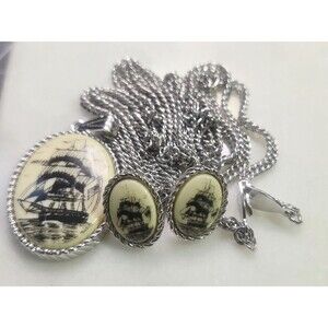 Sarah Coventry 'Legends' faux scrimshaw pendant necklace Earrings Setsilver-tone